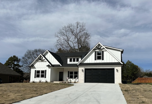 modern inspired farmhouse with driveway, board and batten siding, and brick siding