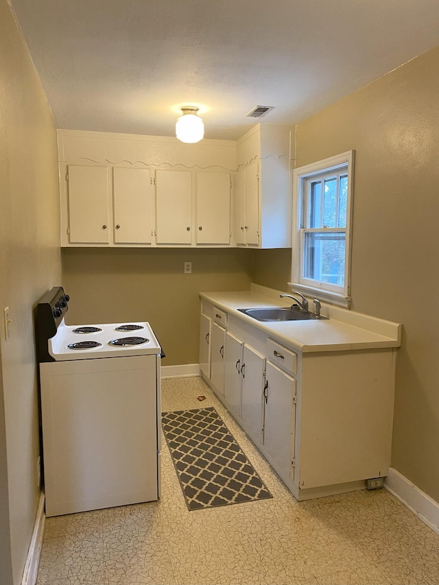 laundry area featuring sink