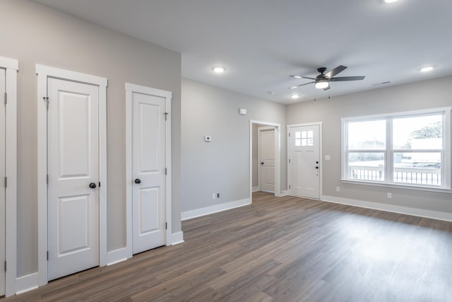 entrance foyer featuring ceiling fan and dark hardwood / wood-style floors