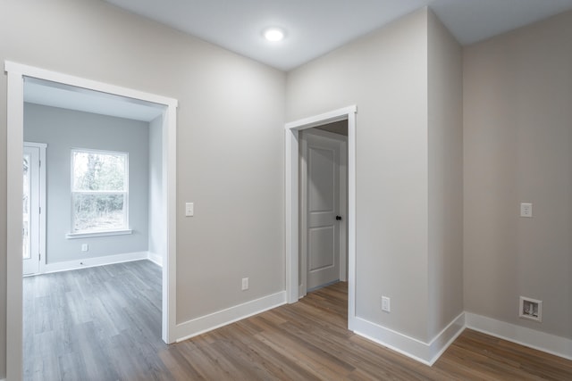 spare room featuring hardwood / wood-style flooring