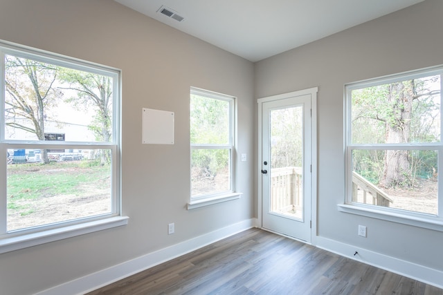 doorway featuring hardwood / wood-style floors