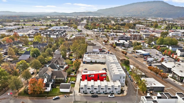 drone / aerial view featuring a mountain view