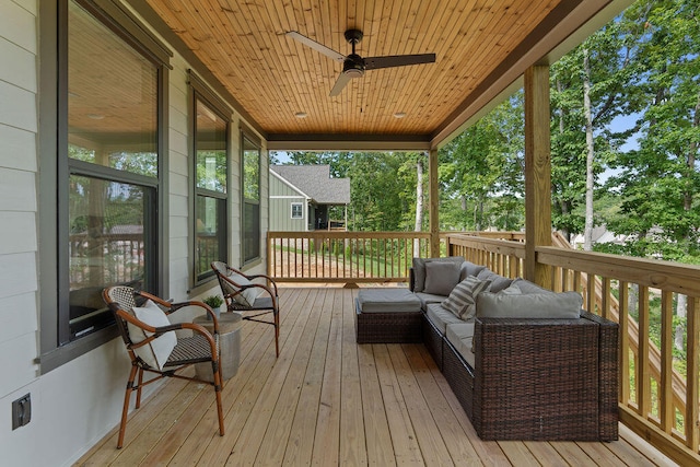 deck featuring an outdoor hangout area and ceiling fan