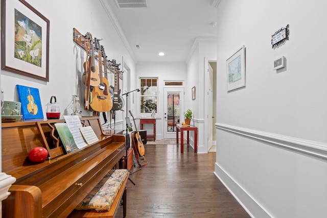 hallway with french doors, dark hardwood / wood-style floors, and crown molding