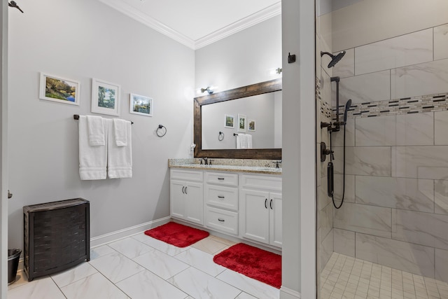 bathroom featuring tiled shower, vanity, and crown molding