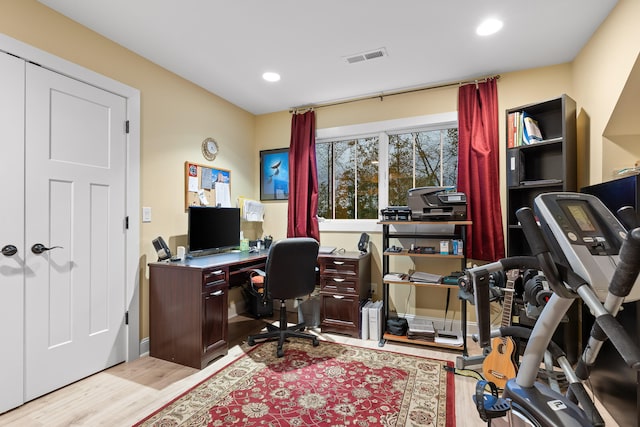 home office featuring light hardwood / wood-style floors