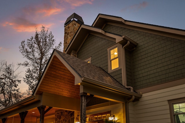 view of property exterior at dusk