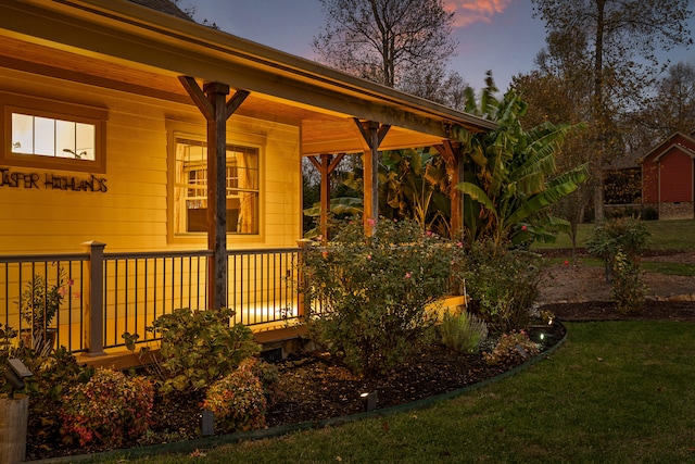 exterior space with a yard and a porch