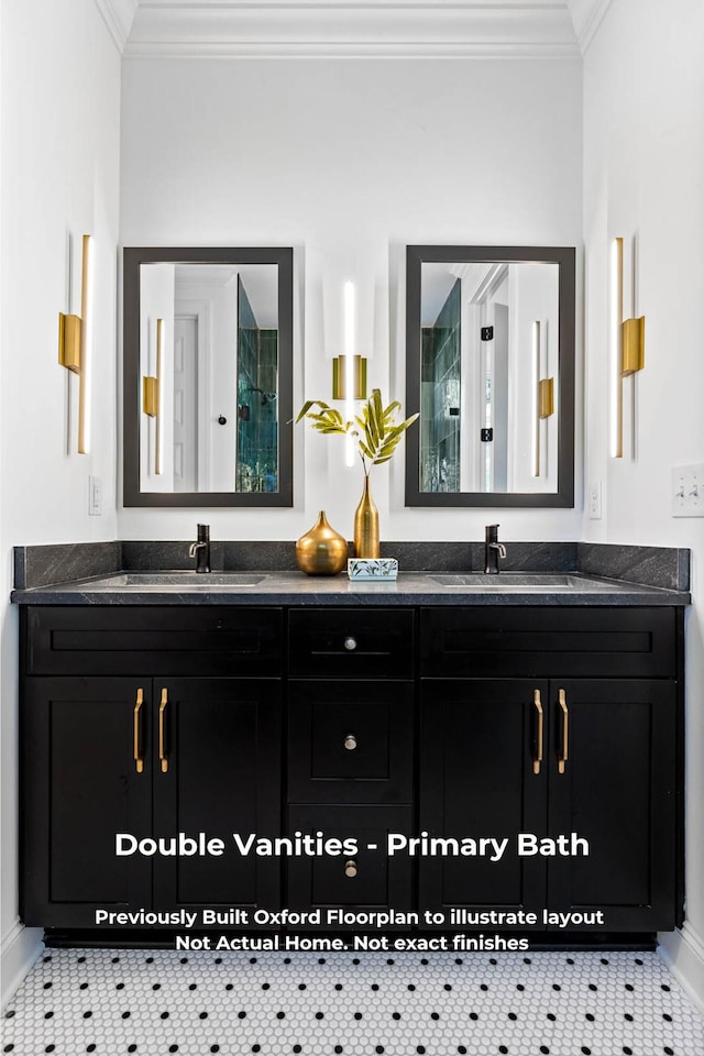 bathroom featuring crown molding, tile patterned flooring, and vanity