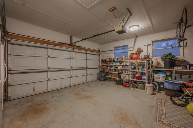 garage featuring a garage door opener