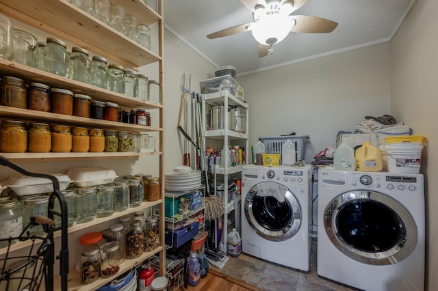 clothes washing area featuring washer and dryer, a textured ceiling, ceiling fan, and crown molding