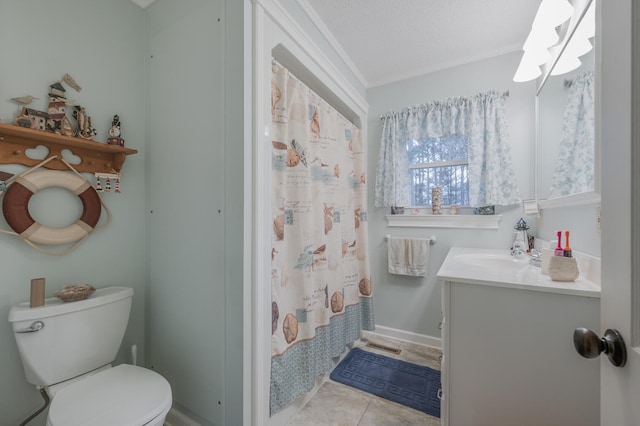 bathroom with tile patterned floors, a textured ceiling, vanity, crown molding, and toilet