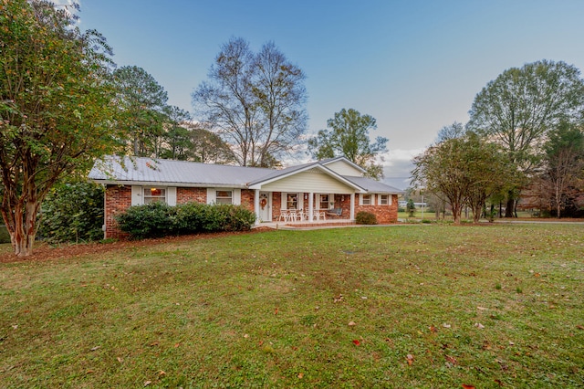 view of front of home with a front lawn