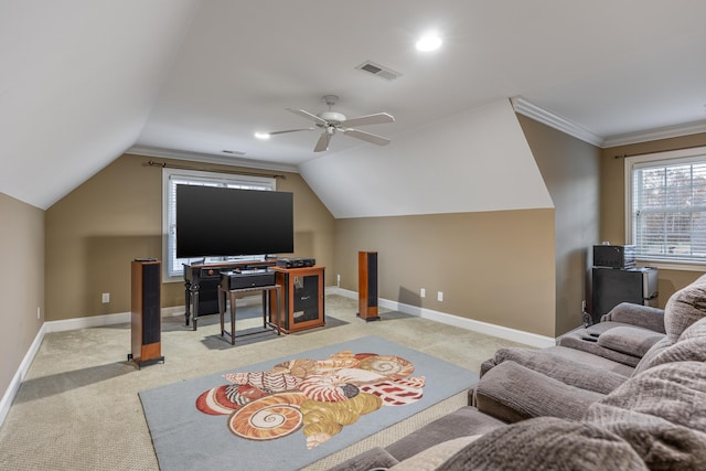 living room featuring light carpet, lofted ceiling, ceiling fan, and crown molding