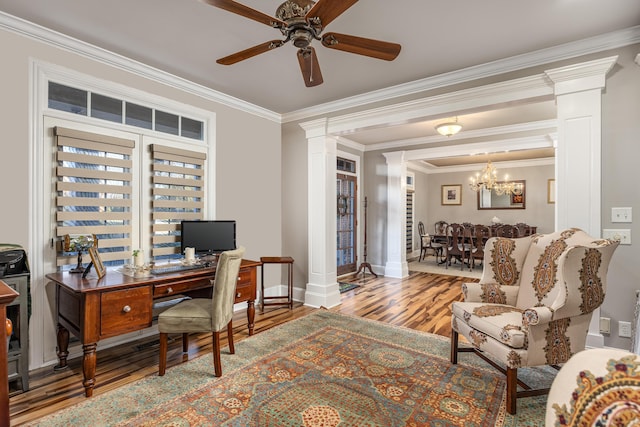 office space featuring ceiling fan with notable chandelier, light hardwood / wood-style floors, and crown molding