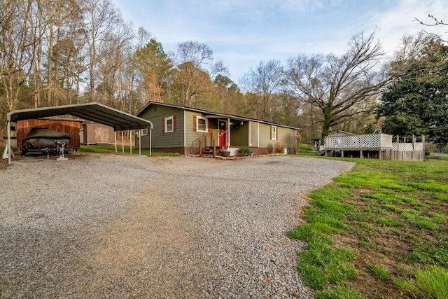 view of front of house with a carport