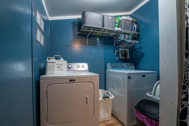 laundry room featuring washing machine and dryer