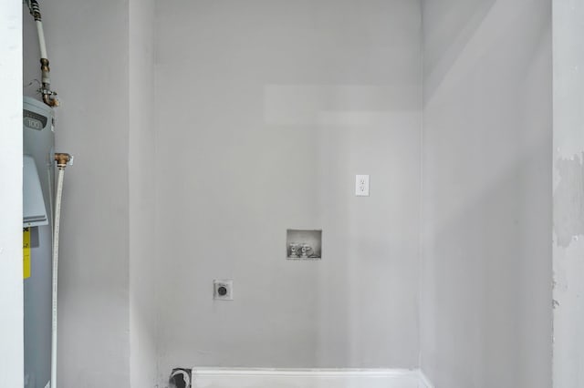 clothes washing area featuring washer hookup and hookup for an electric dryer