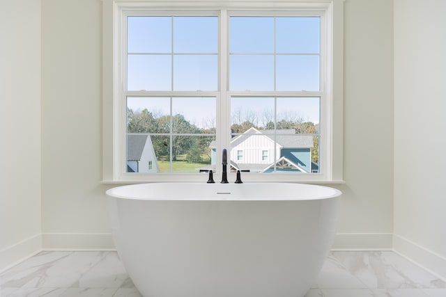 bathroom featuring a tub