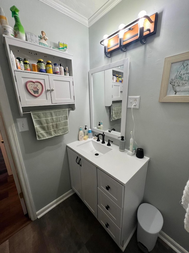 bathroom featuring vanity and crown molding