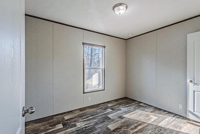 1418 County Road 700, Athens, TN 37303 - unfurnished room featuring visible vents, ornamental molding, and wood finished floors