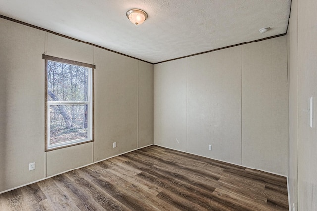 1418 County Road 700, Athens, TN 37303 - empty room with a textured ceiling, crown molding, and wood finished floors