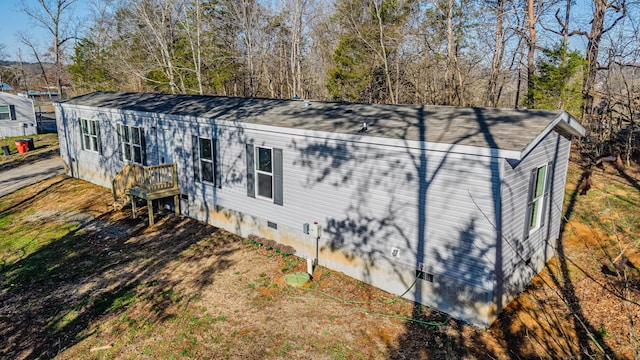 exterior space with crawl space