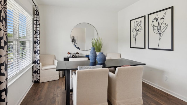 dining area featuring dark hardwood / wood-style floors