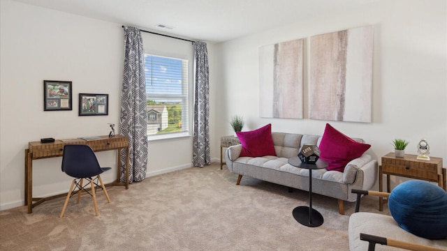 sitting room with light carpet