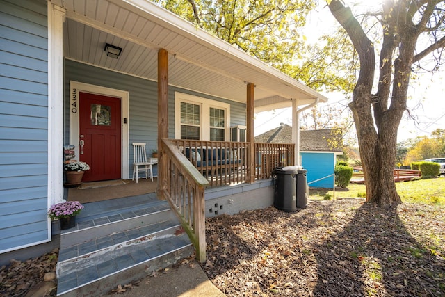 doorway to property featuring a porch