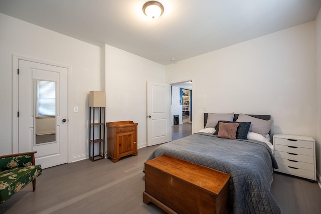 bedroom with wood-type flooring