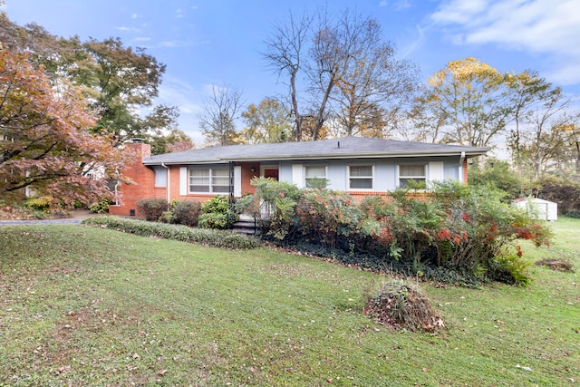 ranch-style house with a front yard