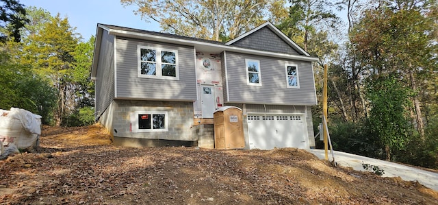 bi-level home featuring a garage