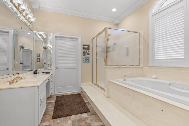 bathroom with vanity, independent shower and bath, and ornamental molding