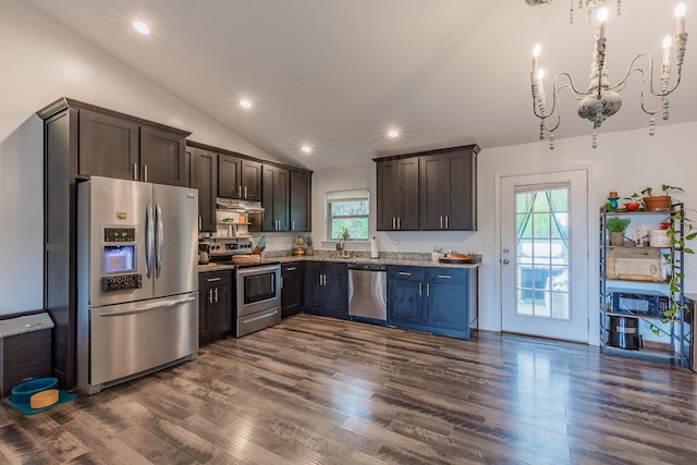 kitchen with dark hardwood / wood-style flooring, dark brown cabinetry, stainless steel appliances, an inviting chandelier, and lofted ceiling