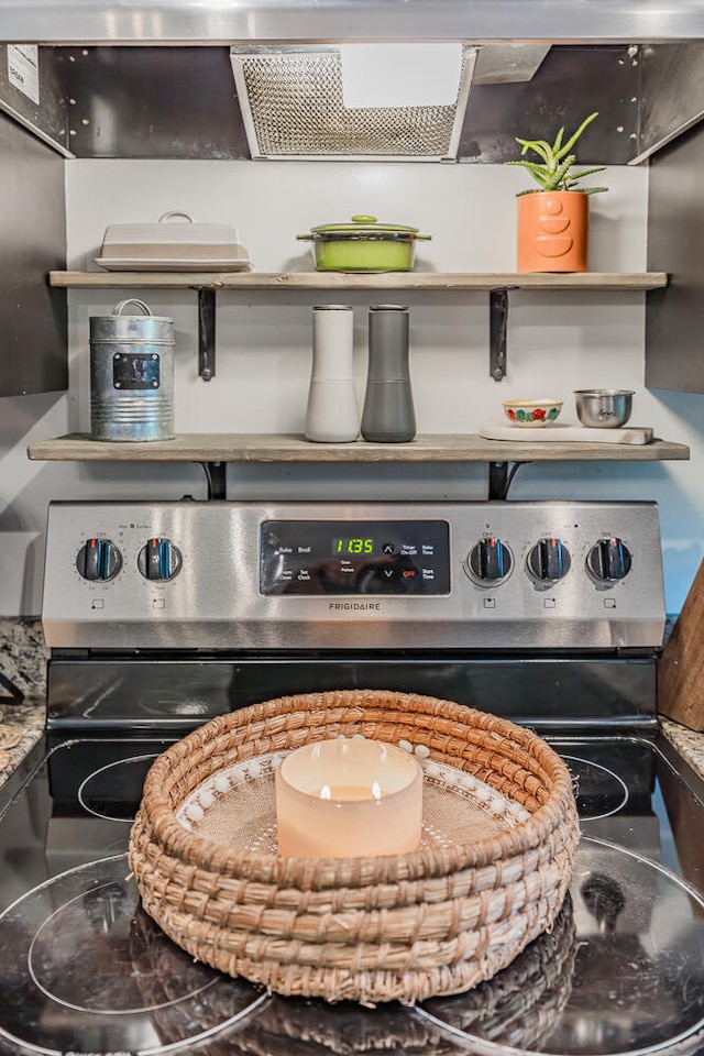 details featuring stainless steel range with electric cooktop