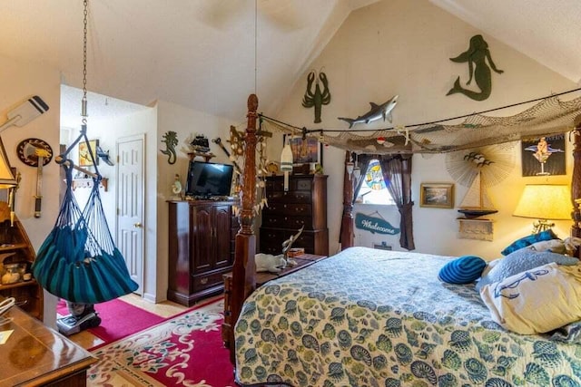 bedroom featuring lofted ceiling