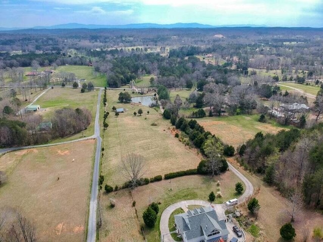 bird's eye view featuring a mountain view and a rural view