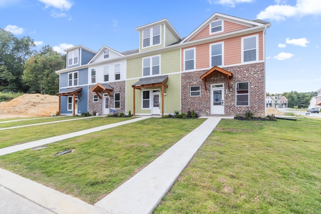 view of front of property with a front lawn