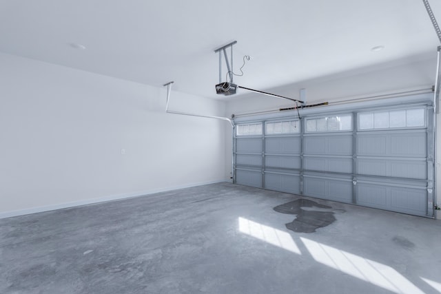 garage featuring a garage door opener