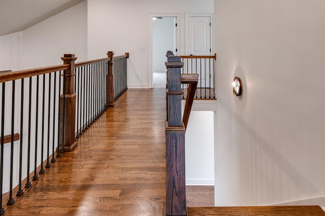 corridor featuring wood-type flooring