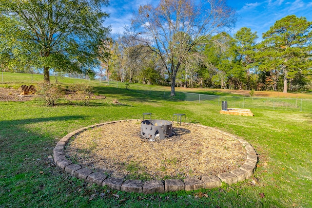 view of yard featuring a fire pit