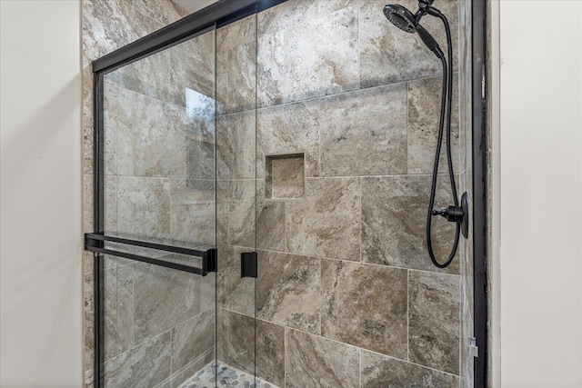 interior details featuring walk in shower