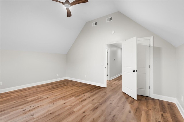 bonus room with light wood-type flooring, ceiling fan, and lofted ceiling