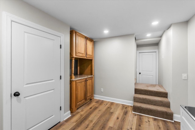 hallway featuring light hardwood / wood-style flooring