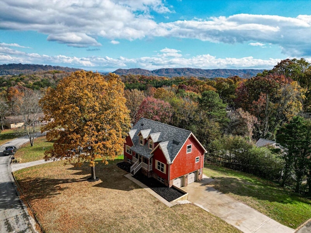 drone / aerial view featuring a mountain view