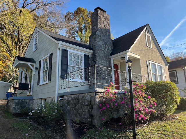 view of front of house with a balcony