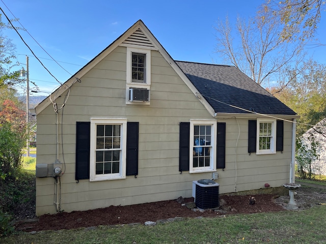 view of home's exterior featuring cooling unit and central air condition unit