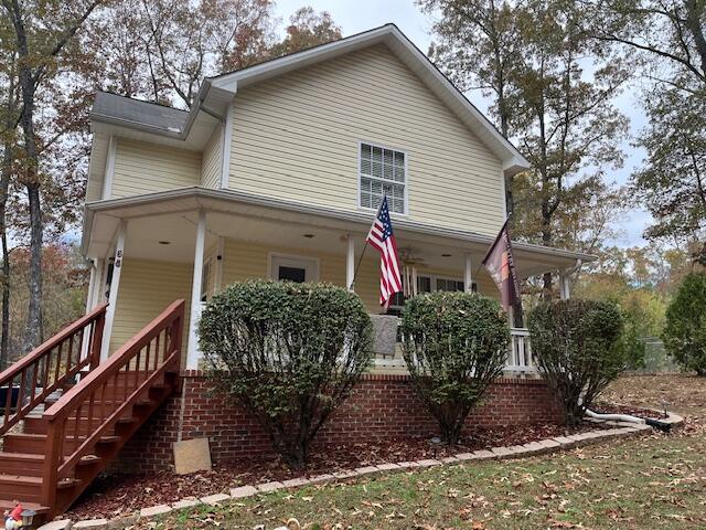 view of front of house with covered porch