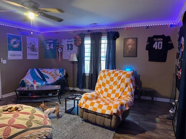 interior space with ceiling fan and wood-type flooring